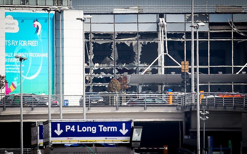 Zwaar beschadigde vertrekhal van Zaventem. Beeld AFP