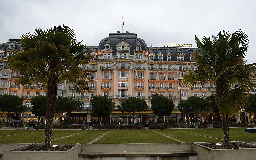 Het paleis in Montreux, in Zwitserland, waar de vredesbesprekingen worden gehouden. Beeld AFP