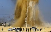De Israëlische luchtmacht valt posities in de Gazastrook aan, nadat Palestijnen een raket richting Israël hebben afgevuurd. beeld AFP, Mohammed Abbed