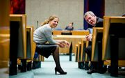 Carola Schouten (Christenunie) en Elbert Dijkgraaf (SGP) dinsdag tijdens het debat over het Belastingplan van staatssecretaris Eric Wiebes in de Tweede Kamer. Beeld ANP