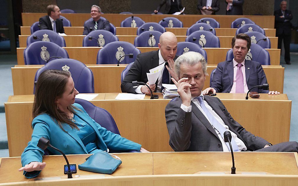 PVV-ers (VLNR) Fleur Agema, Joram van Klaveren, Geert Wilders en Martin Bosma tijdens de hoofdelijke stemming over het debat over het 'Marokkanenprobleem'. Foto ANP