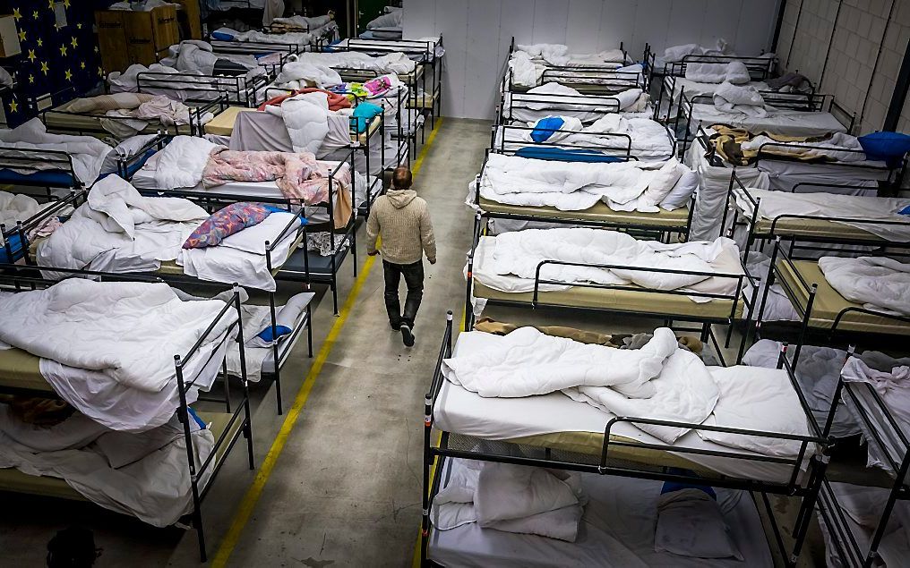 „Je vertelde dat de winter verschrikkelijk is voor jouw milieu.” Foto: Haagse daklozen bereiden zich voor op de nacht in een winteropvang. beeld ANP, Lex van Lieshout