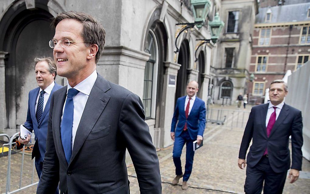 De vier onderhandelaars Pechtold (D66), Rutte (VVD), Segers (CU) en Buma (CDA). Beeld ANP, Jerry Lampen.