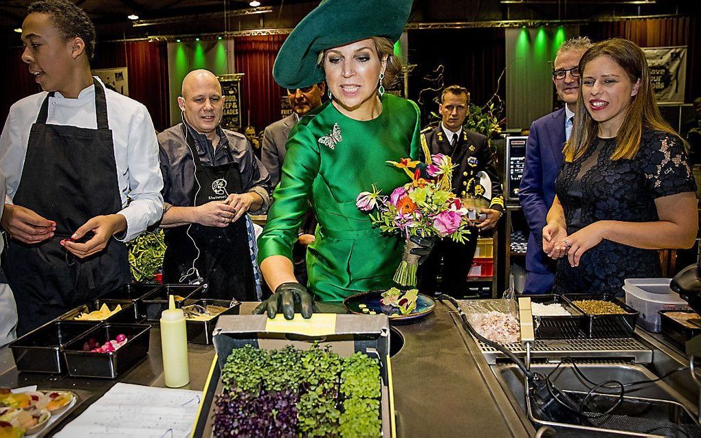 Koningin Máxima en minister Schouten (R) in Zwolle. beeld ANP