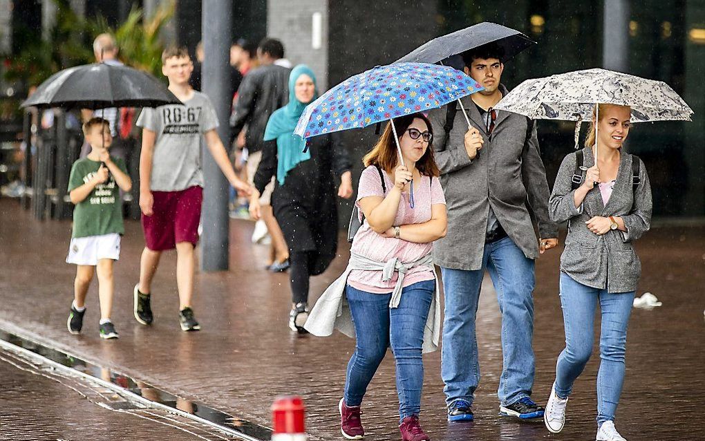 Regen in Nederland: voor christenen reden om God daarvoor te danken. beeld ANP, Remko de Waal