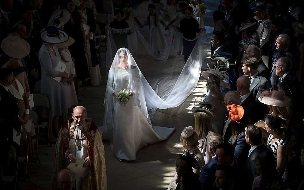 De bruid arriveert in St George's Chapel, op Windsor Castle. beeld AFP