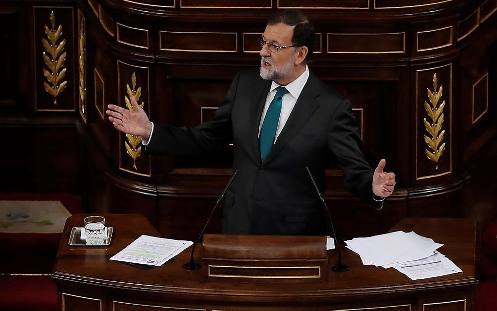 De Spaanse premier Rajoy wordt vrijdag naar alle waarschijnlijkheid naar huis gestuurd wegens een corruptieschandaal. beeld AFP, Juan Carlos Hidalgo