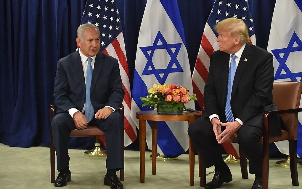 De Amerikaanse president Trump benadrukte woensdag in een gesprek met de Israëlische premier Netanyahu het belang van een tweestatenoplossing voor het conflict tussen Israël en de Palestijnen. beeld AFP, Nicholas Kamm