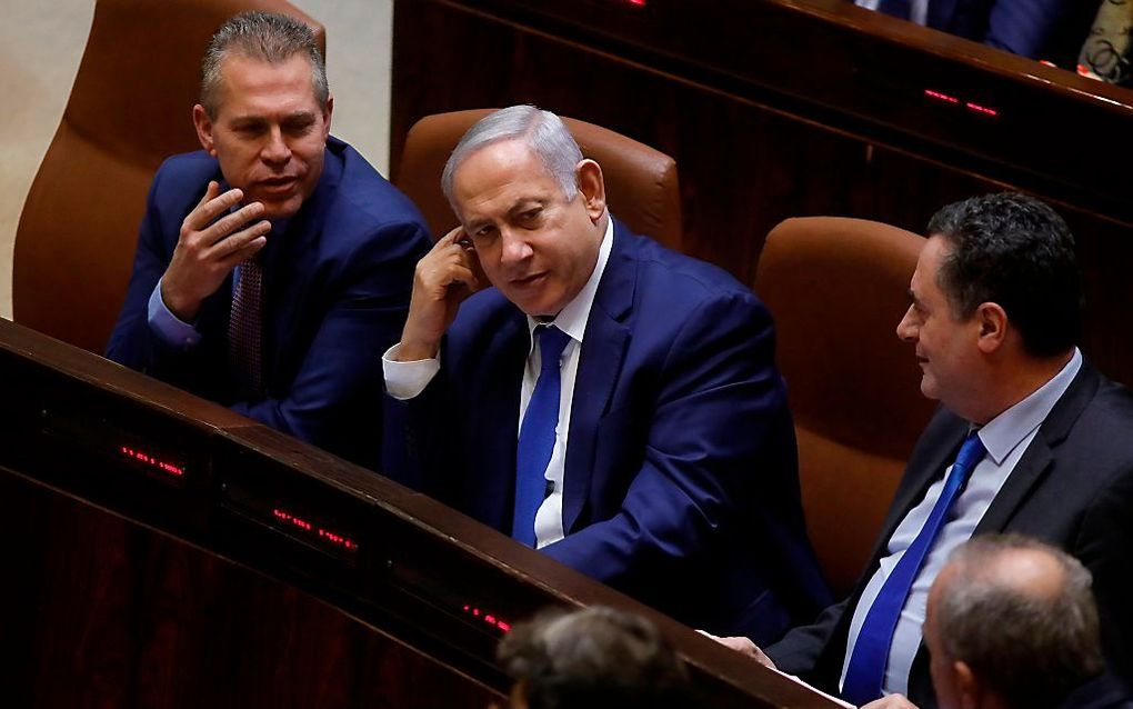 De Israëlische premier Netanyahu stemde woensdag in met een vervroeging van de verkiezingen. beeld AFP, Menahem Kahana