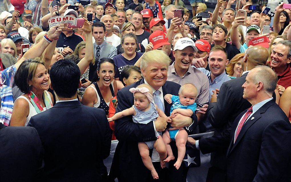 Donald Trump tijdens een campagnebijeenkomst in Colorado. beeld AFP