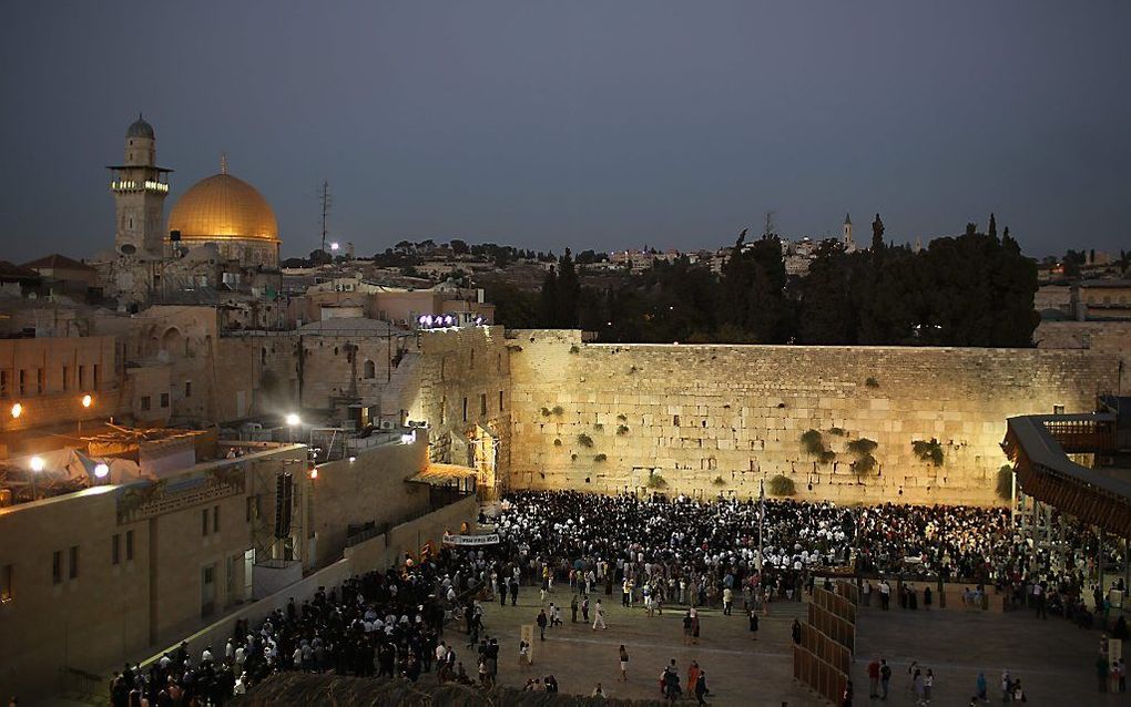 Klaagmuur met de Tempelberg in Jeruzalem.  beeld AFP, Menahem Kahana