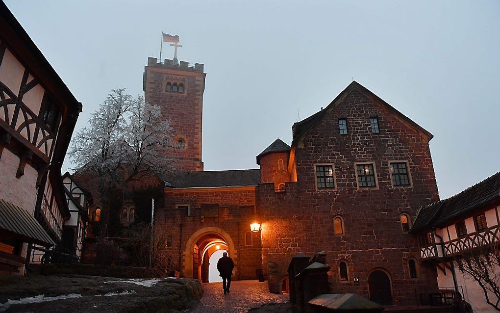 De Wartburg waar de reformator Maarten Luther verbleef.  beeld AFP, Jens Kalaene