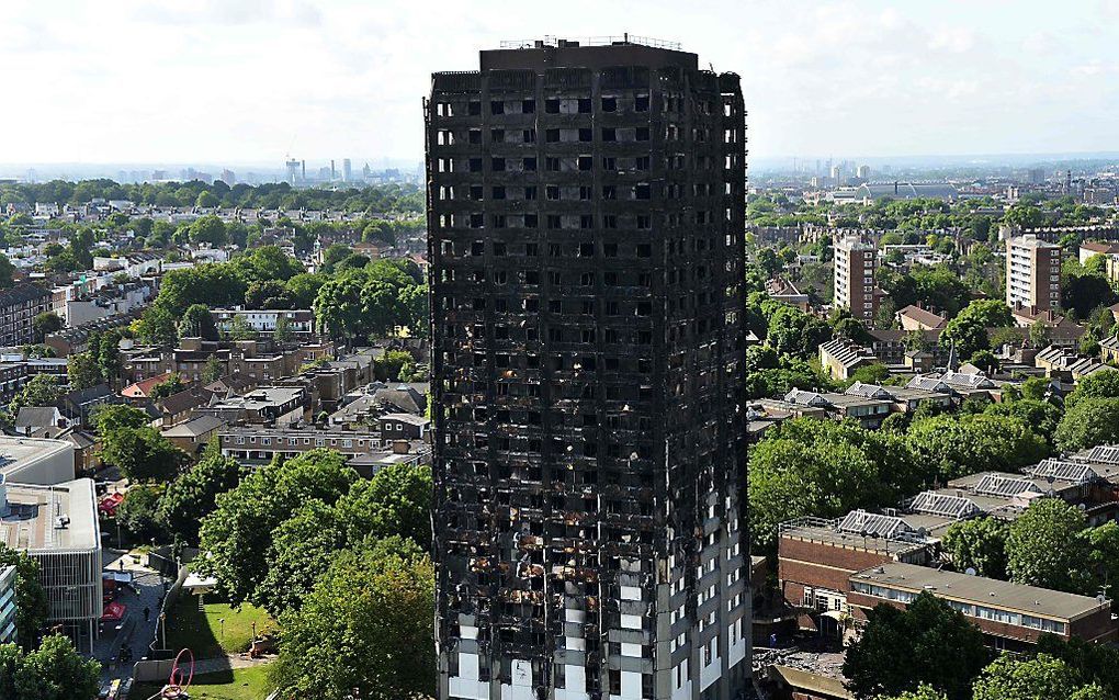 De Grenfell Tower na de verwoestende en dodelijke brand. beeld AFP