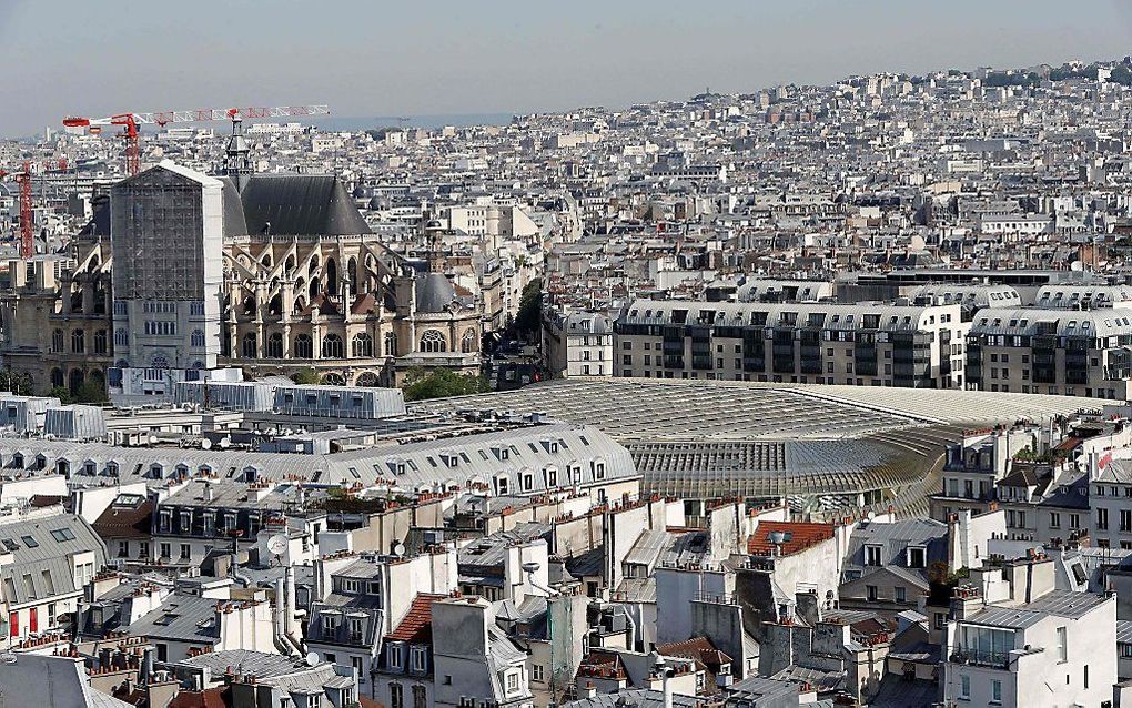 De Saint-Eustache (l.) in Parijs. beeld  AFP, Francois Guillot