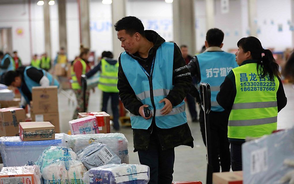 Drukte op Singles Day in China. beeld AFP