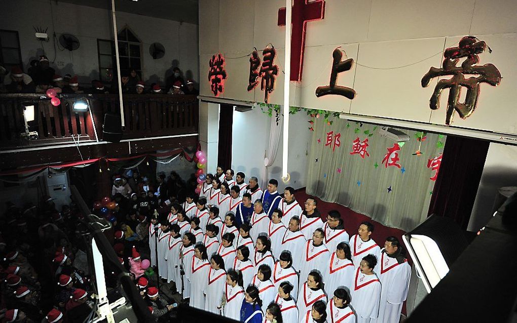 Kerstdienst in een kerk in China, eind december. beeld AFP