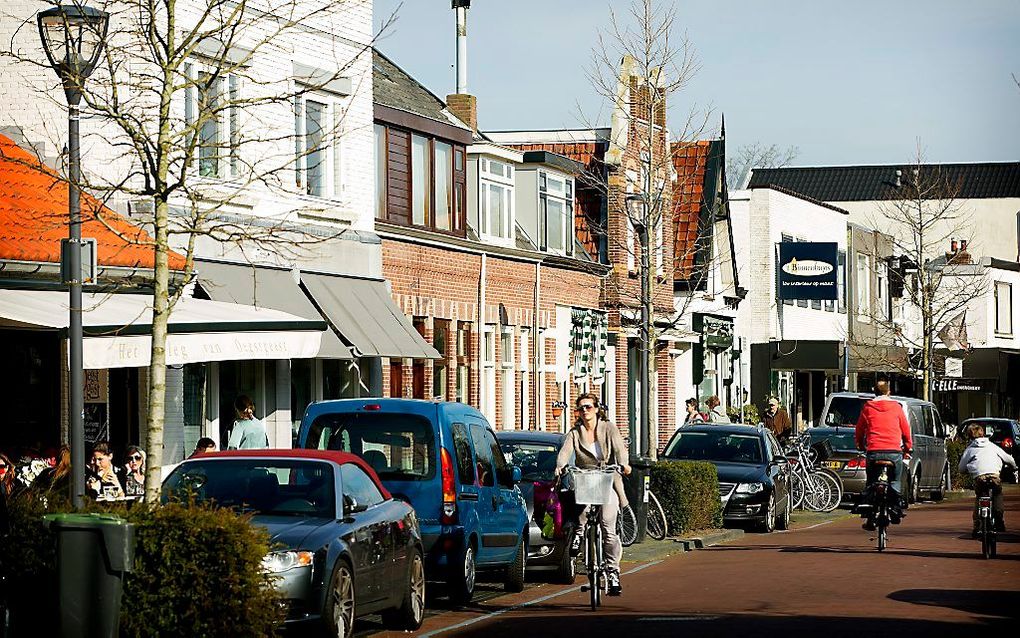 „Het kapitalisme heeft geleid tot een ongekende welvaartstijging, die ervoor zorgt dat de armen het in onze tijd beter hebben dan de rijken vroeger.” Foto: winkelstraat in Oegstgeest. beeld ANP, Valerie Kuypers