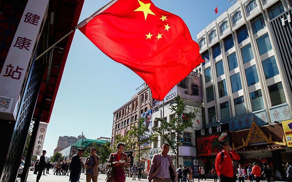 Een ”sociaal kredietsysteem” is volgens de Chinese overheid noodzakelijk voor het „bouwen van een harmonieuze socialistische samenleving”. Foto: winkelstraat in Beijing. beeld EPA, Rolex Dela Pena