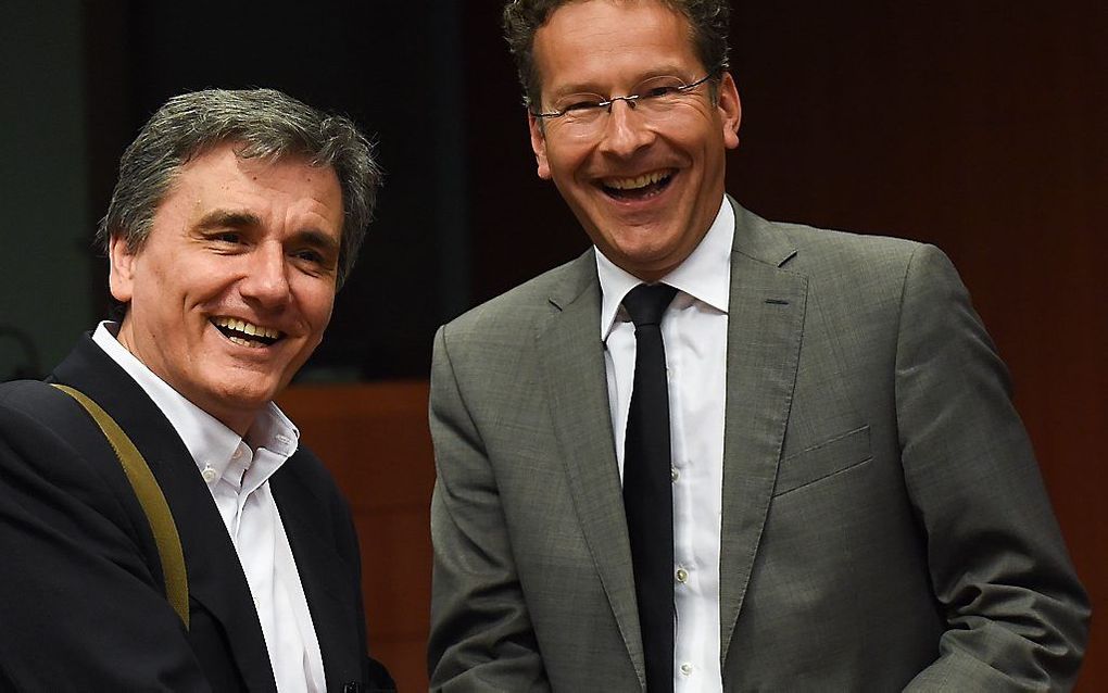 Tsakalotos en Dijsselbloem. beeld AFP