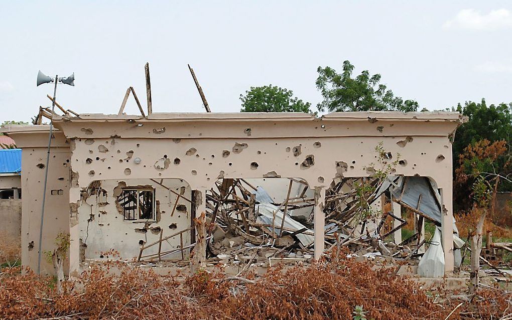 Een door Boko Haram kapotgeschoten gebouw in het noorden van Nigeria. beeld AFP/Stringer