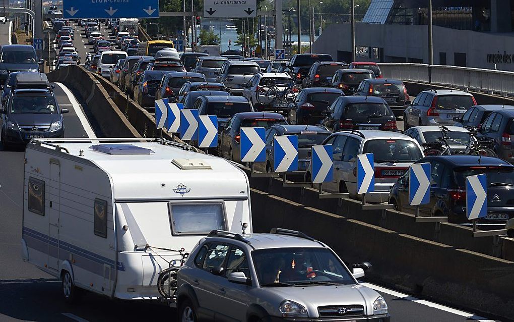 Reizigers moeten rekening houden met vakantiefiles op de Europese routes in België, Frankrijk, Duitsland, Zwitserland en Oostenrijk. beeld AFP