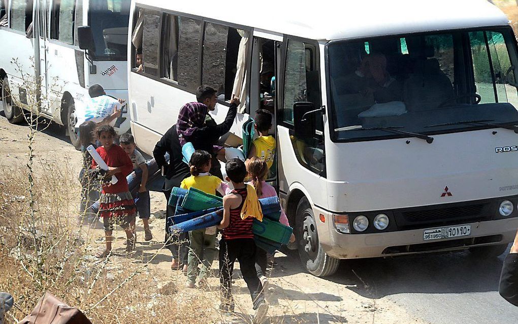 Evacuatie uit Aleppo, begin augustus. beeld EPA