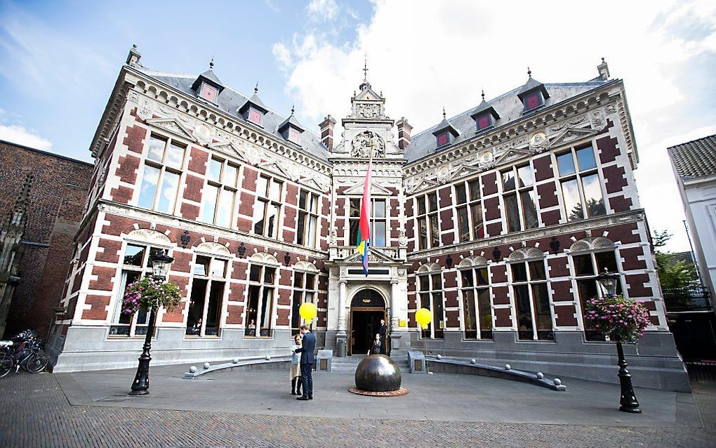 Uit onderzoek van FNV en VAWO uit 2017 komt naar voren dat zeven van de tien medewerkers van de Nederlandse universiteiten de werkdruk hoog tot zeer hoog vinden. Foto: Academiegebouw Universiteit Utrecht. beeld ANP, Jeroen Jumelet