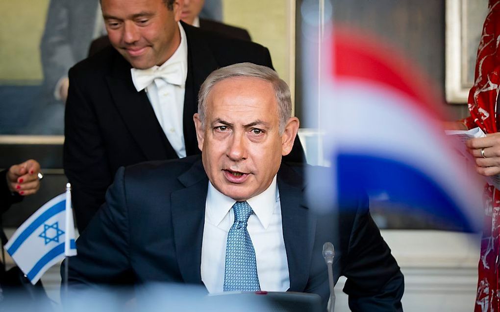 De Israëlische premier Netanyahu woensdagmorgen tijdens een besloten gesprek met Tweede en Eerste Kamerleden. beeld ANP