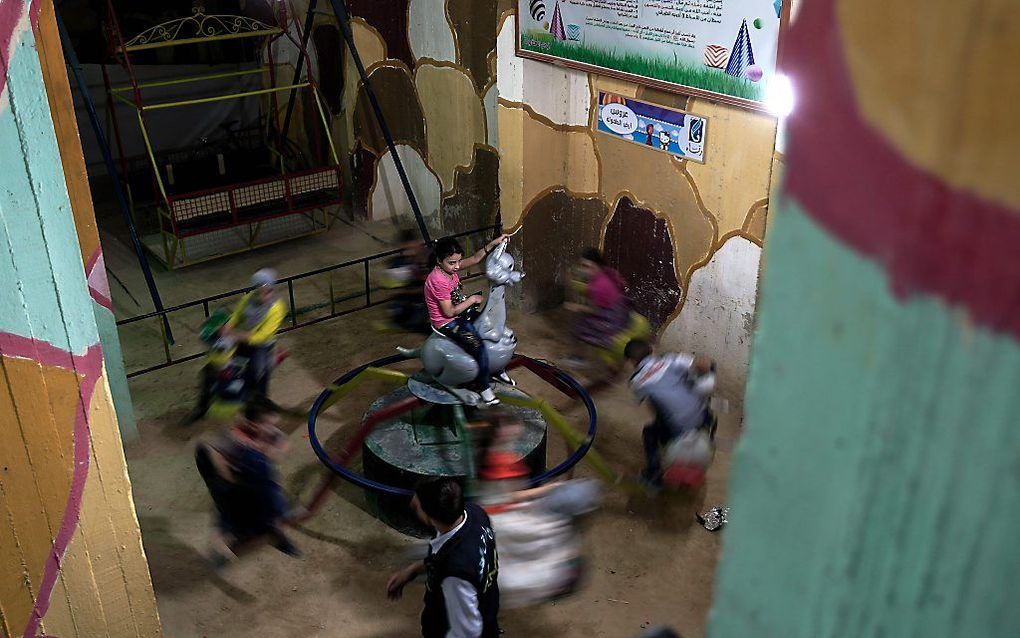 Kinderen vermaken zich in Damascus. beeld AFP