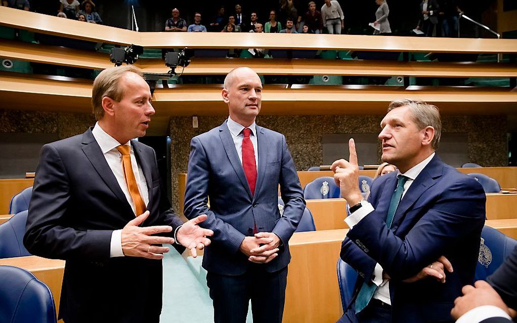 Van der Staaij (SGP), Segers (CU)  en Buma (CDA) in de Kamer. beeld ANP, Bart Maat.