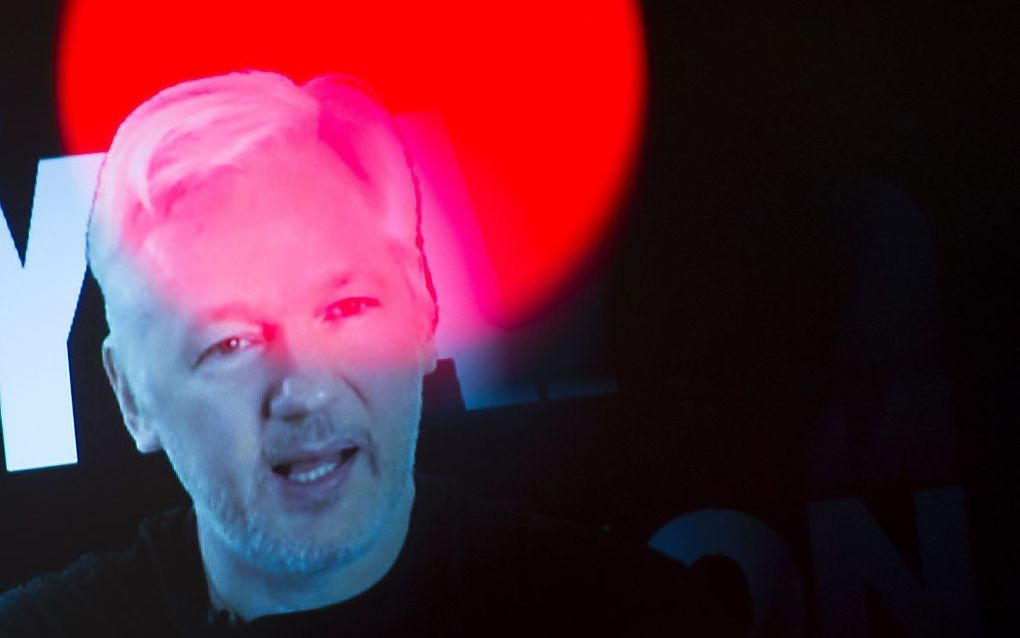 Assange. beeld AFP