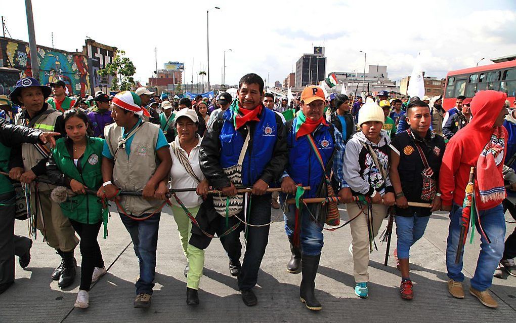 Protestmars in Bogota. beeld AFP