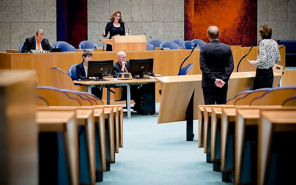 Minister Schippers en de Kamerleden Van der Staaij en Dik-Faber in debat in 2016. beeld ANP