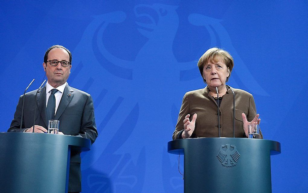 Merkel en Hollande in Berlijn. beeld EPA