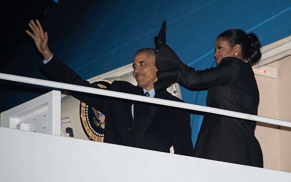 De Amerikaanse president Barack Obama en zijn vrouw Michelle. beeld AFP