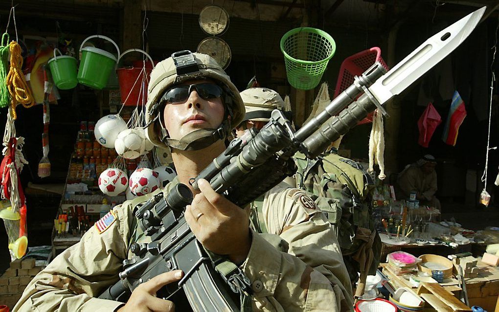 Een Amerikaanse militair in Fallujah, november 2013. beeld AFF