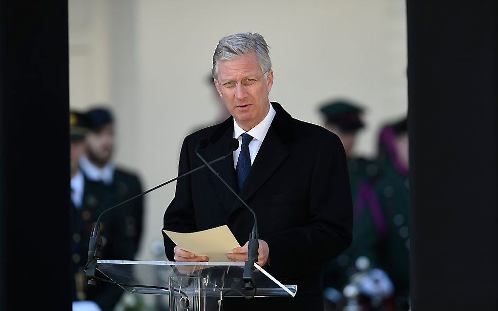 Koning Filip houdt een toespraak voor overlevenden en nabestaanden van de aanslagen in Brussel precies een jaar geleden. Het is uitzonderlijk dat de Belgische vorst live spreekt. beeld AFP