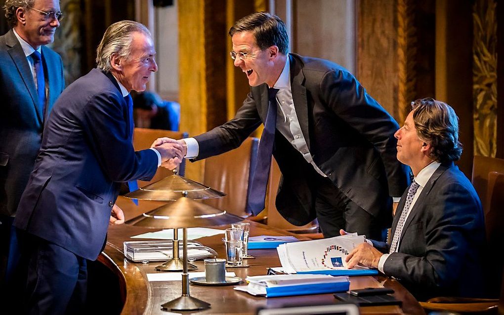 Thom de Graaf (D66), Elco Brinkman (CDA), Premier Mark Rutte en Minister Bert Koenders van Buitenlandse Zaken (v.l.n.r.) tijdens het debat over het Oekraïne verdrag. beeld ANP