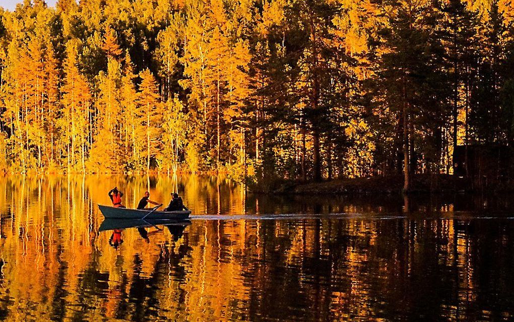 Het lijkt wel herfst op deze foto, die maandag gemaakt werd bij de Russische stad Sortavala. beeld AFP