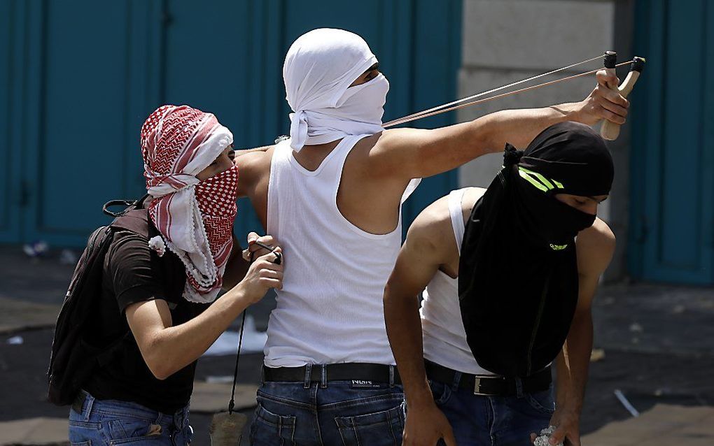 Wekelijks protest van Palestijnen op de Westoever. beeld EPA