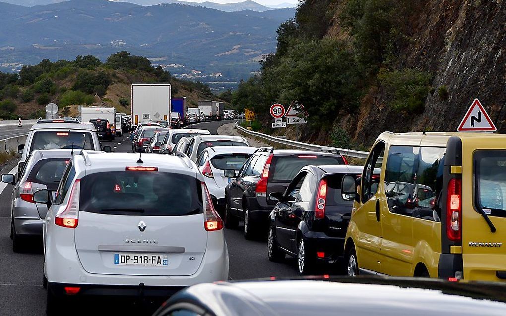 Terugkerende vakantiegangers bij het Franse Perpignan, niet ver van de grens met Spanje. beeld ANP