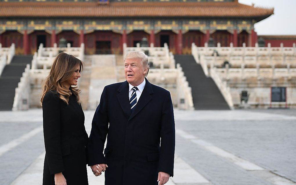 Trump met zijn vrouw in de Verboden Stad in de Chinese hoofdstad Peking. beeld AFP