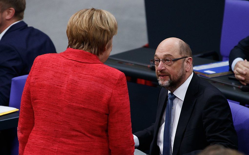 Merkel (l.) en Schulz. beeld EPA