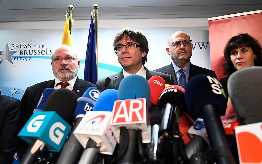 Puigdemont (m.). beeld AFP