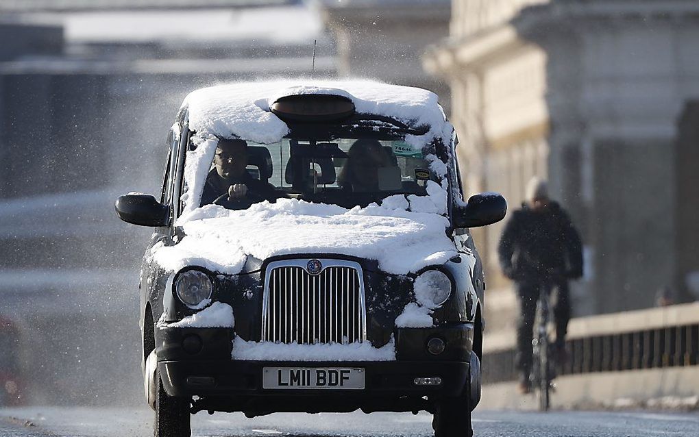 Taxi op London Bridge. beeld AFP