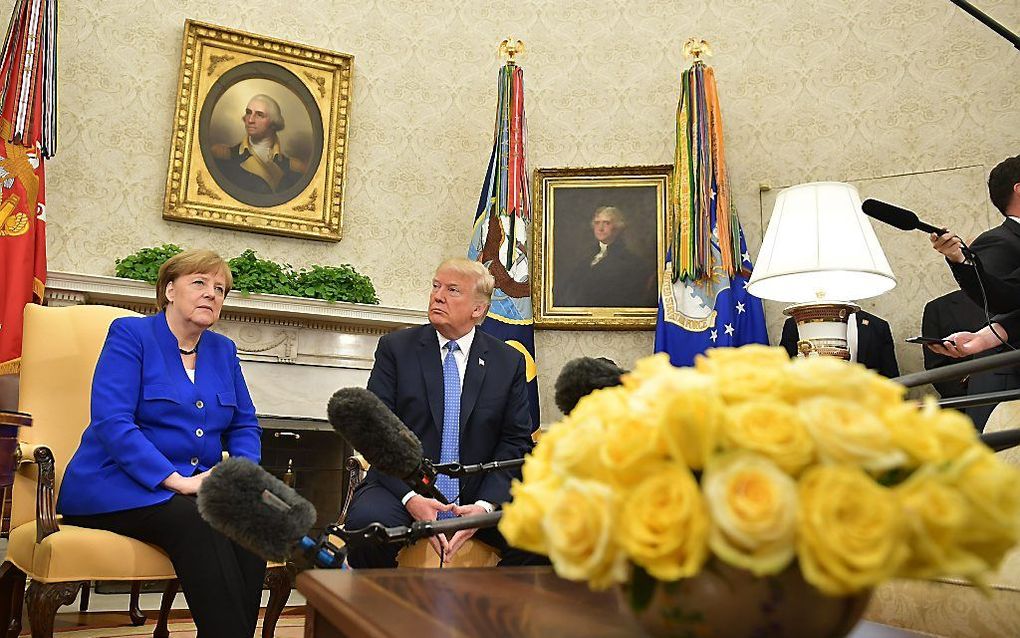 Trump en Merkel in het Witte Huis. beeld AFP