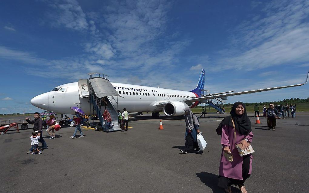 De stewardess zegt rustig: „Nu is het tijd om te bidden.” beeld AFP, Adek Berry