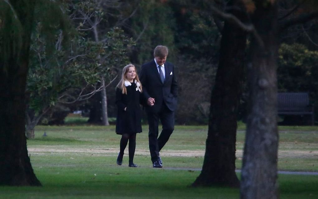 De koning met zijn jongste dochter, Ariane. beeld AFP