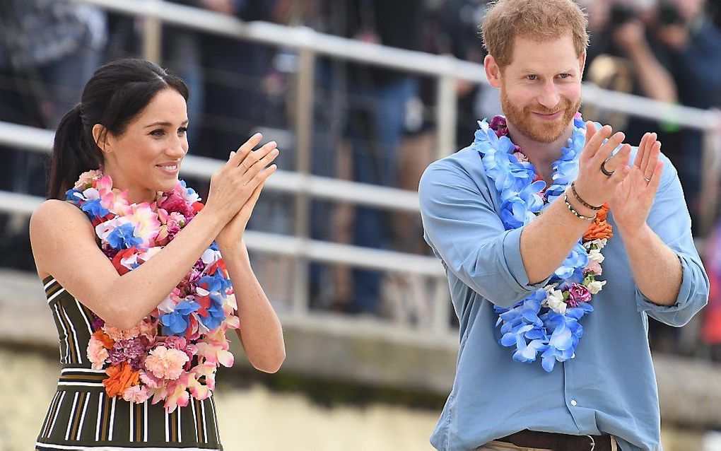 De Britse prins Harry en zijn vrouw Meghan in Sydney. beeld EPA