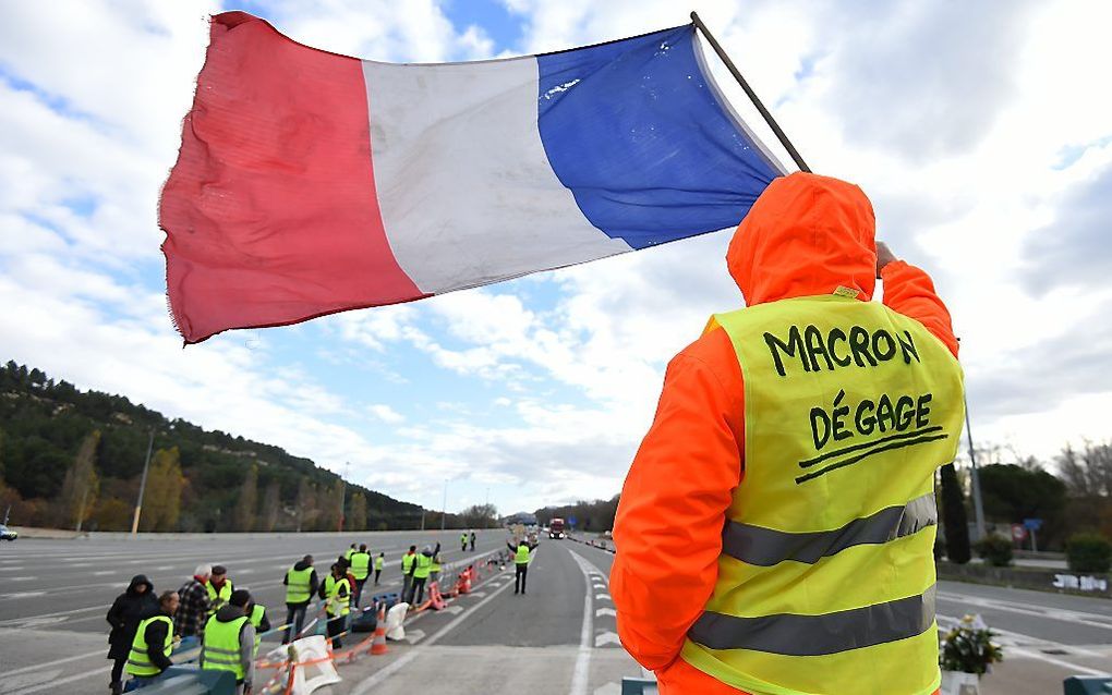 Van dit 'gele hesje' mag Macron vertrekken. beeld AFP